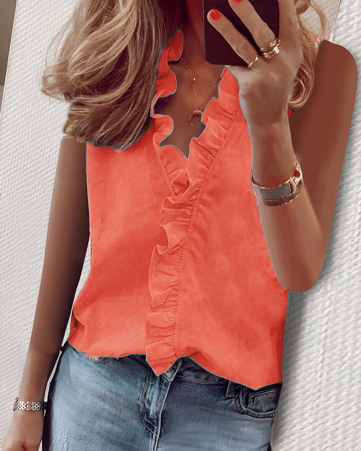 Clara | Luftig og elegant bluse med flæser